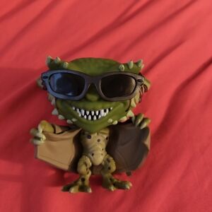 Green Reptile Figurine with Sunglasses